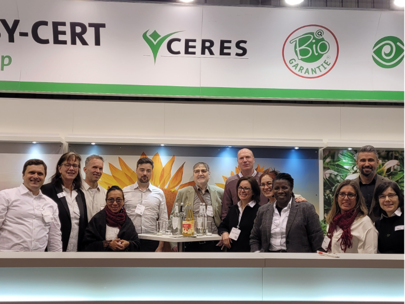 Biofach team members in front of stand